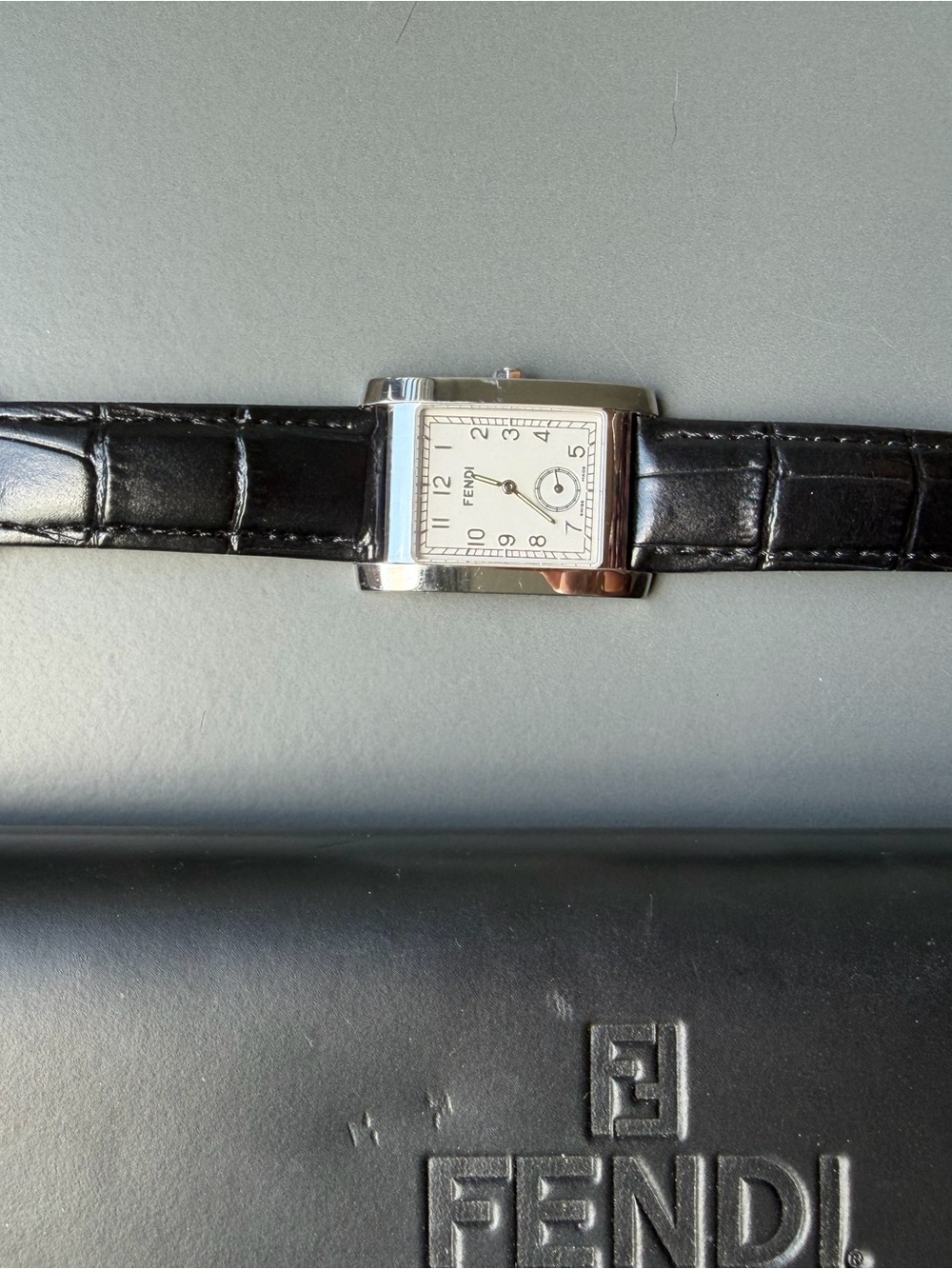 Fendi 7000G watch with rectangular case and black leather strap